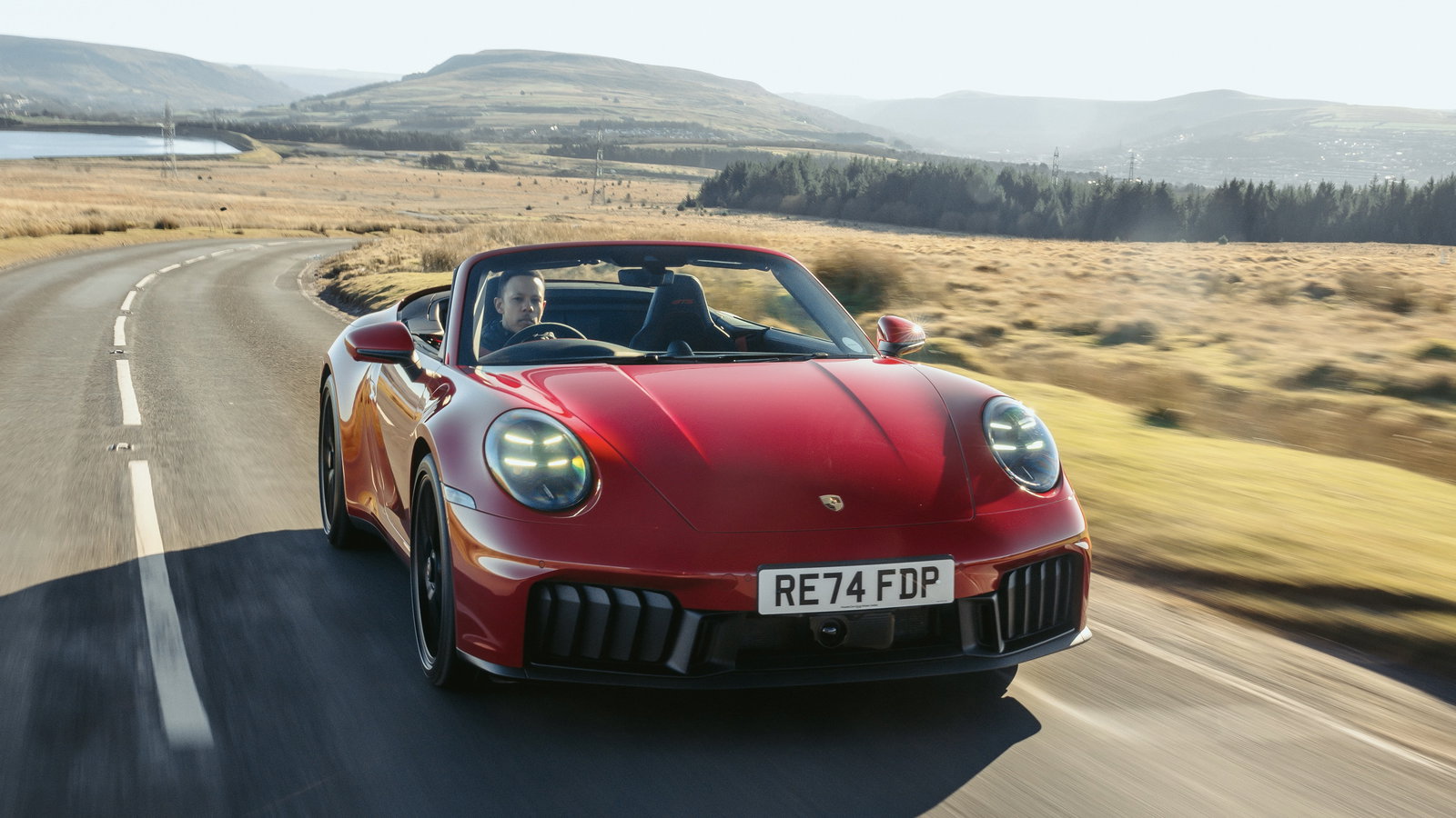 Porsche 911 Carrera 4 GTS Cabriolet - front, driving